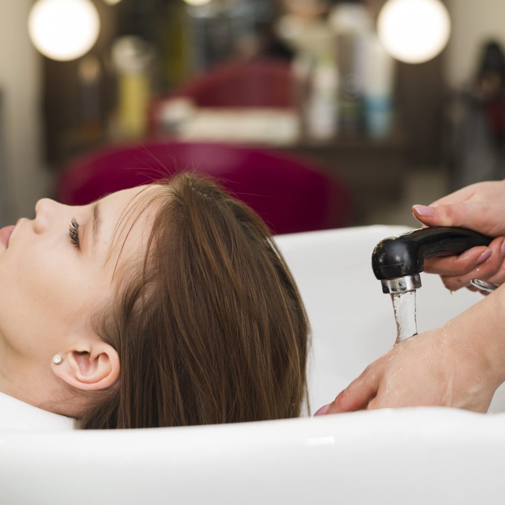 brunette-girl-getting-her-hair-washed